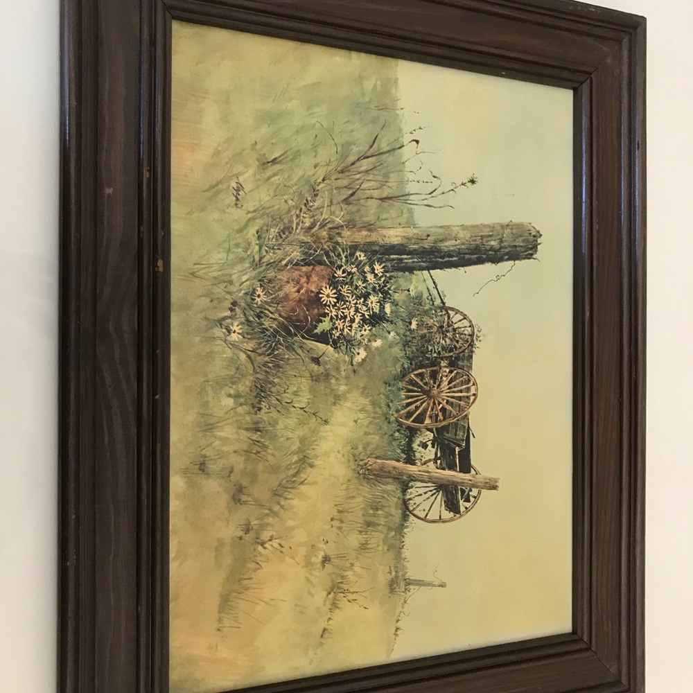 A vintage prairie print with wooden frame